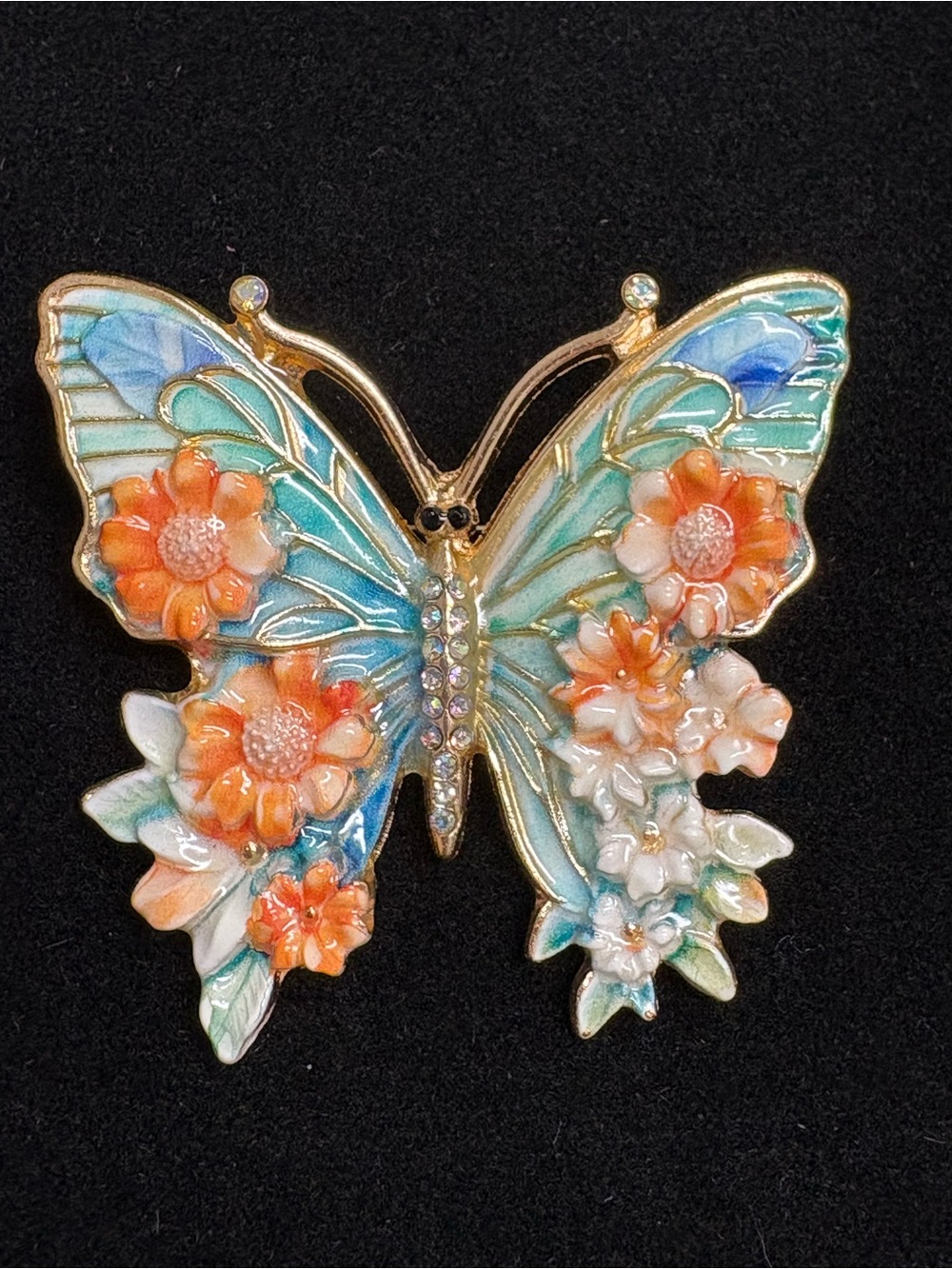 Enamel butterfly brooch. Gold tone.
